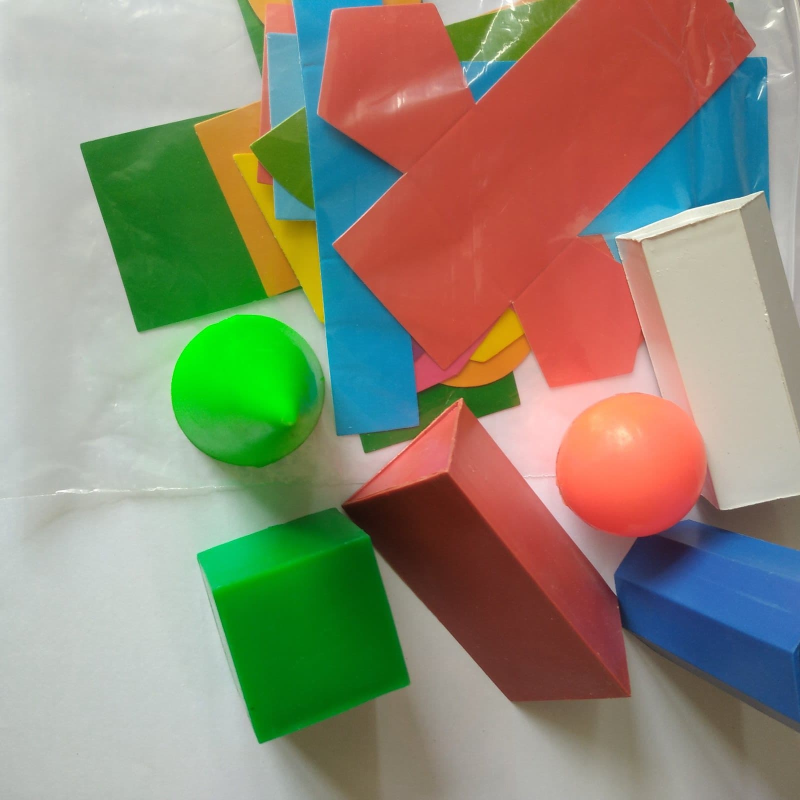 Set of brightly coloured, plastic, geometric 3D shapes,S.no 35